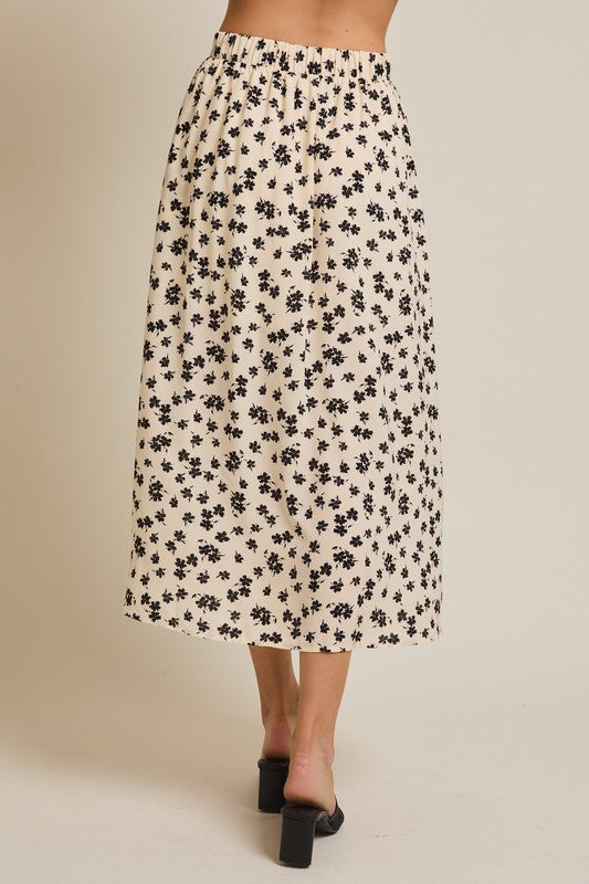 The Lizeth Button-Up Floral Midi Skirt in Cream + Black