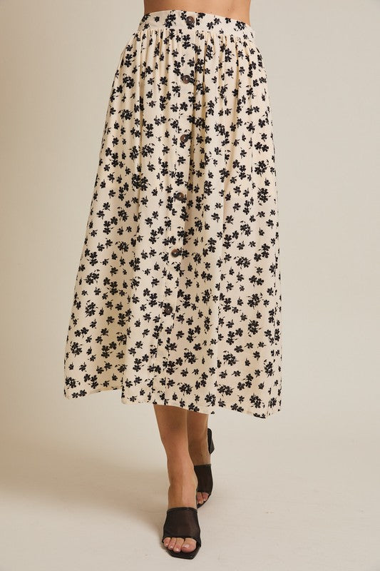 The Lizeth Button-Up Floral Midi Skirt in Cream + Black