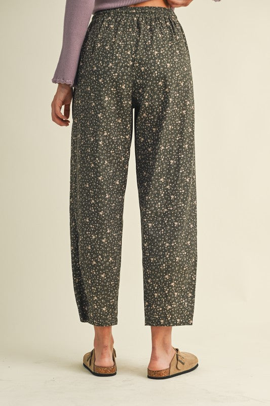 The Allora Ditsy Floral Barrel Pant in Deep Green