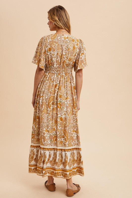 The Gisborne Flutter Sleeve Floral Maxi Dress in Antique Gold