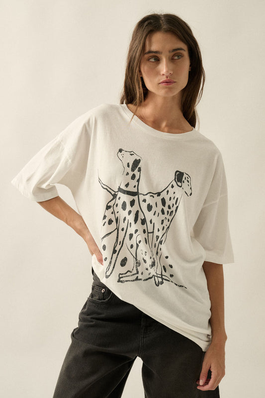An ivory graphic tee featuring a black Dalmatian dog design, a soft crew neckline, and a relaxed, comfortable fit for everyday wear.