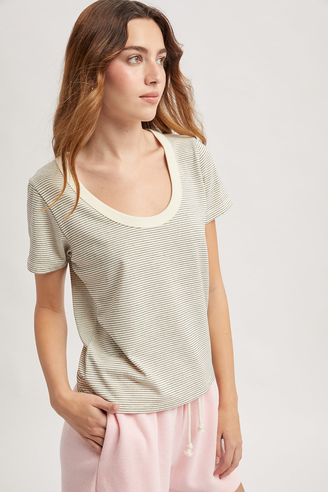 Scoop neck tee in cream with black stripes. Short sleeves. 