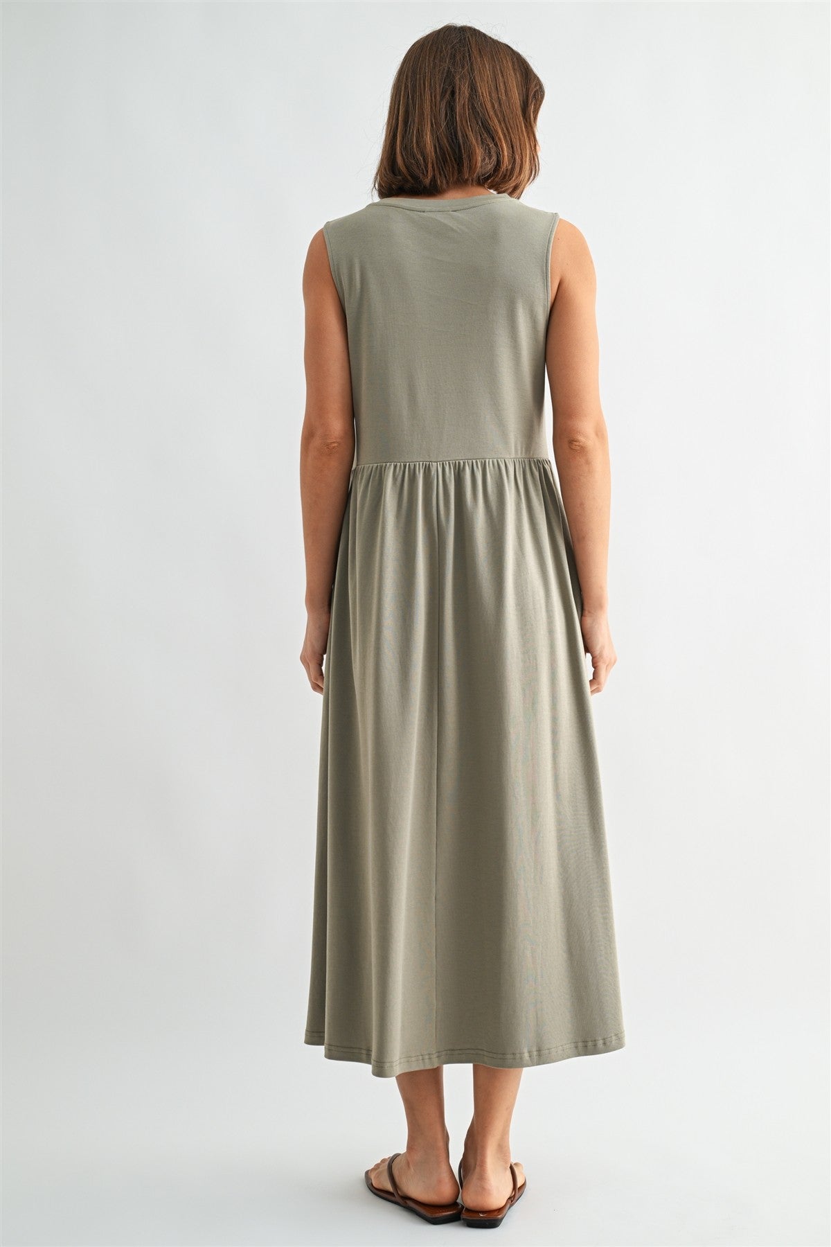 Olive knit tank midi dress. T-shirt neck with pockets. 