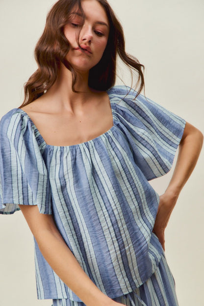 A women's lightweight square-neck blouse featuring vertical stripes in blue tones with loose flutter sleeves and a relaxed fit.