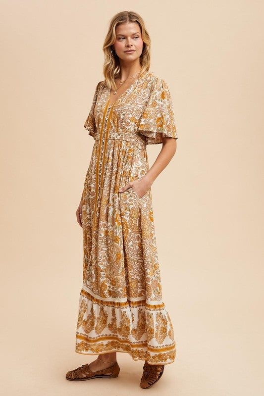 The Gisborne Flutter Sleeve Floral Maxi Dress in Antique Gold
