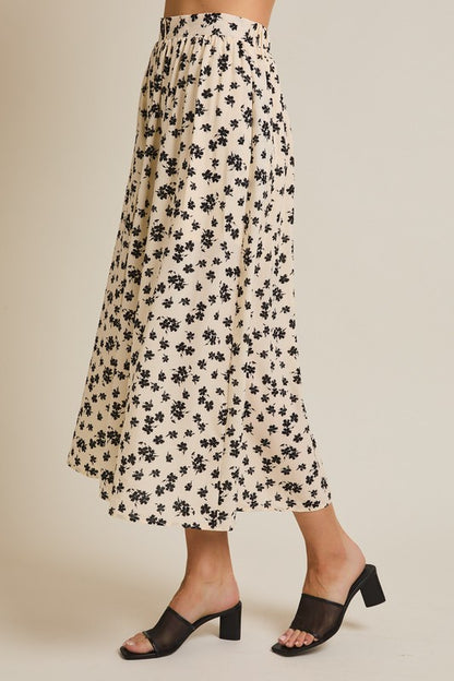 The Lizeth Button-Up Floral Midi Skirt in Cream + Black