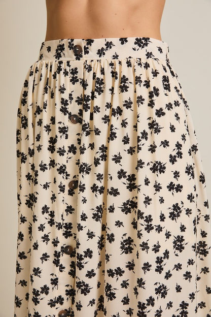 The Lizeth Button-Up Floral Midi Skirt in Cream + Black