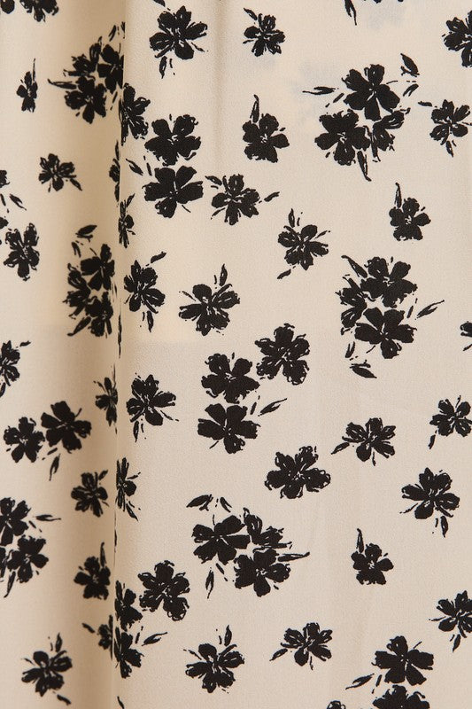 The Lizeth Button-Up Floral Midi Skirt in Cream + Black