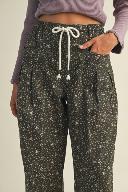 The Allora Ditsy Floral Barrel Pant in Deep Green