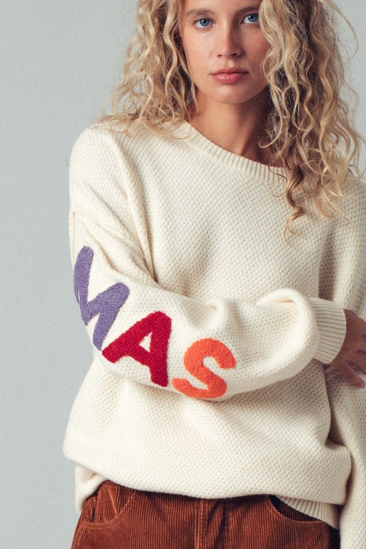 The Merry Christmas Sweater in Ivory