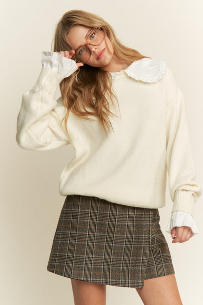 The Nora Ruffle Collared Knit Sweater in Cream