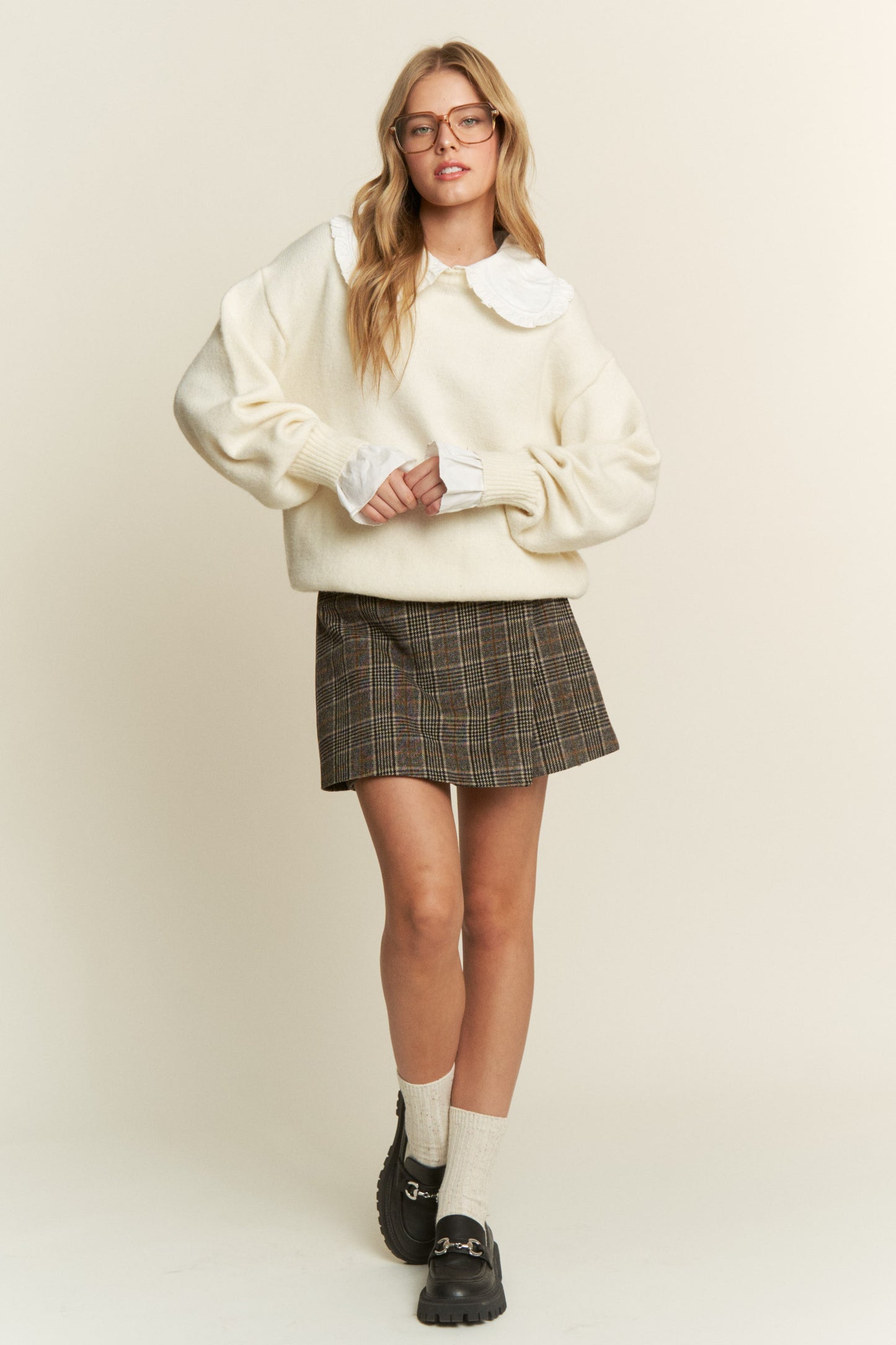 The Nora Ruffle Collared Knit Sweater in Cream