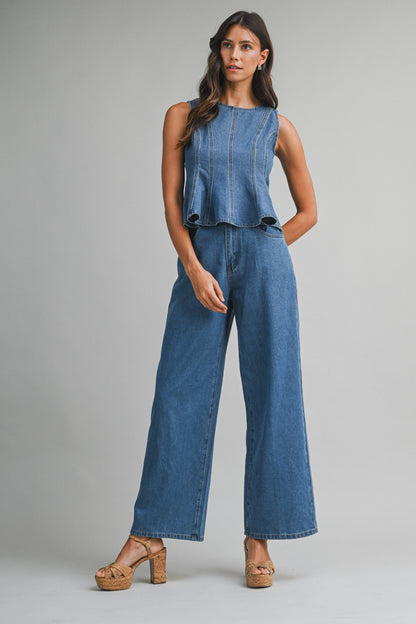 Denim sleeveless peplum top and matching wide jean pants with front button set. 