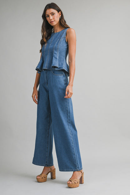 Denim sleeveless peplum top and matching wide jean pants with front button set. 