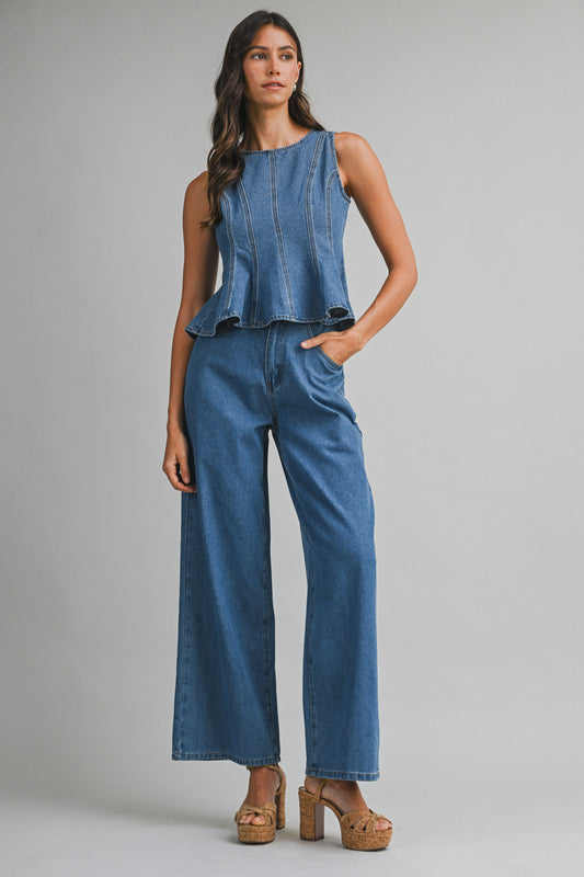 Denim sleeveless peplum top and matching wide jean pants with front button set. 