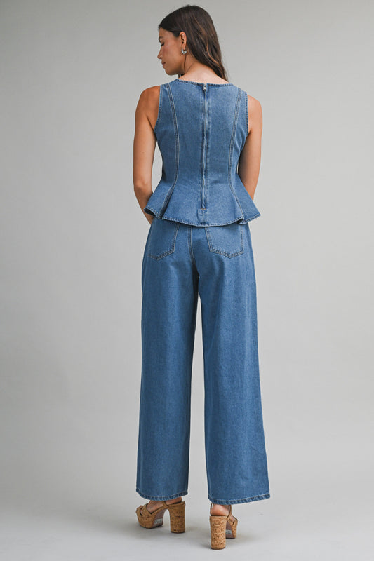 Denim sleeveless peplum top and matching wide jean pants with front button set. 