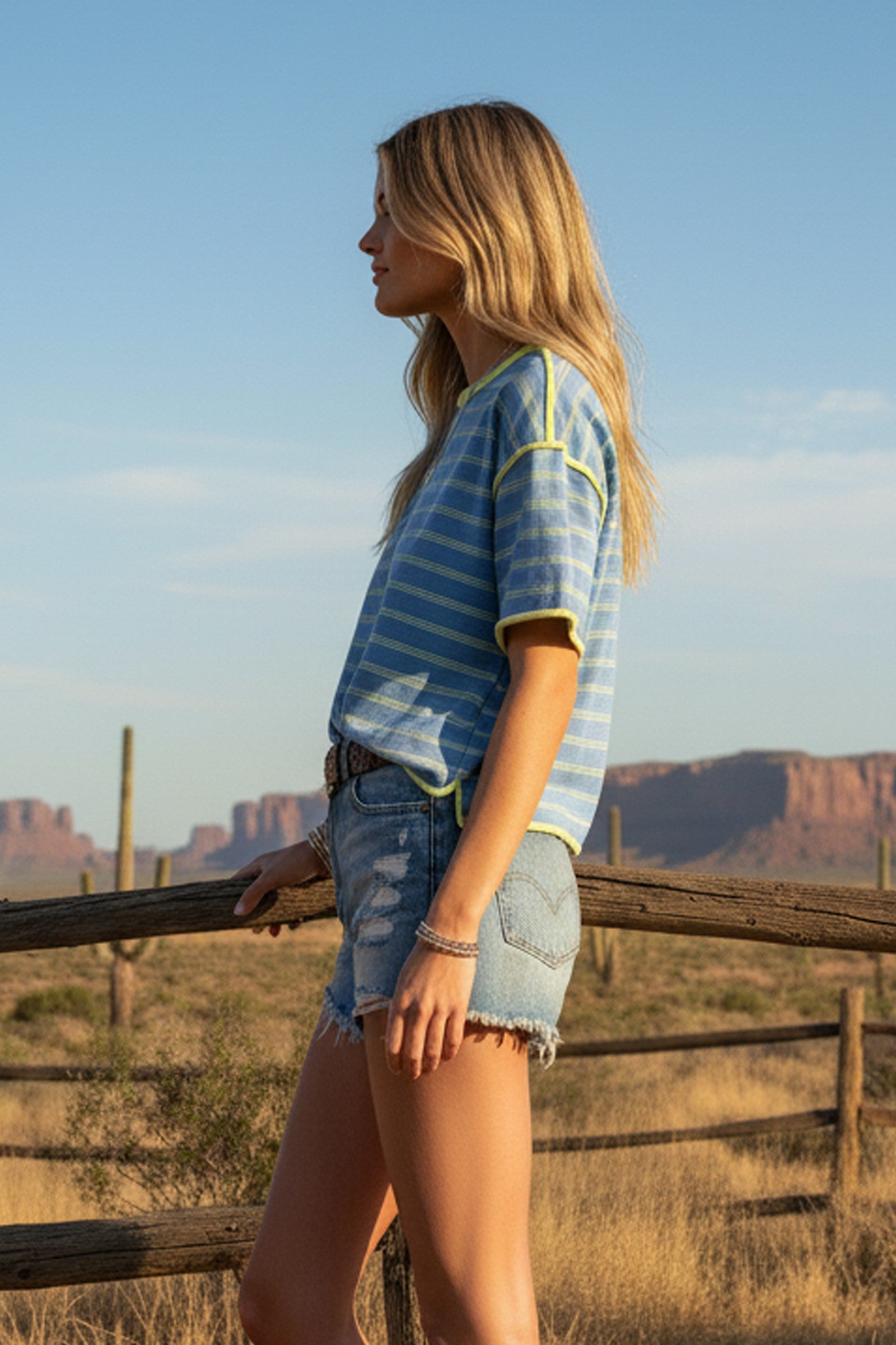 oversized horizontal striped tee featuring a relaxed drop-shoulder fit, soft crew neckline, and a boyfriend-style silhouette in blue and lime.