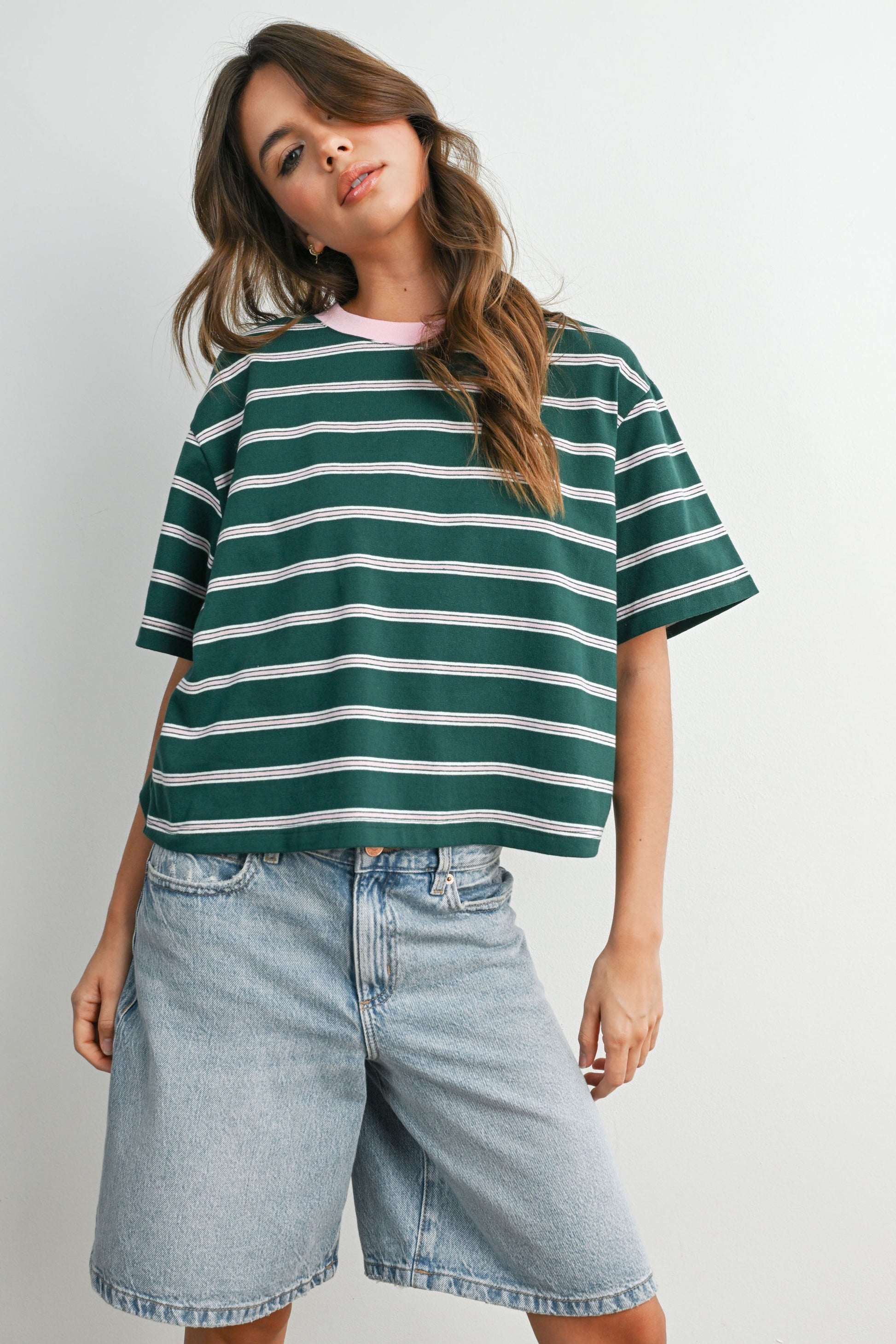 Boxy cut green and light pink striped cropped tee. 