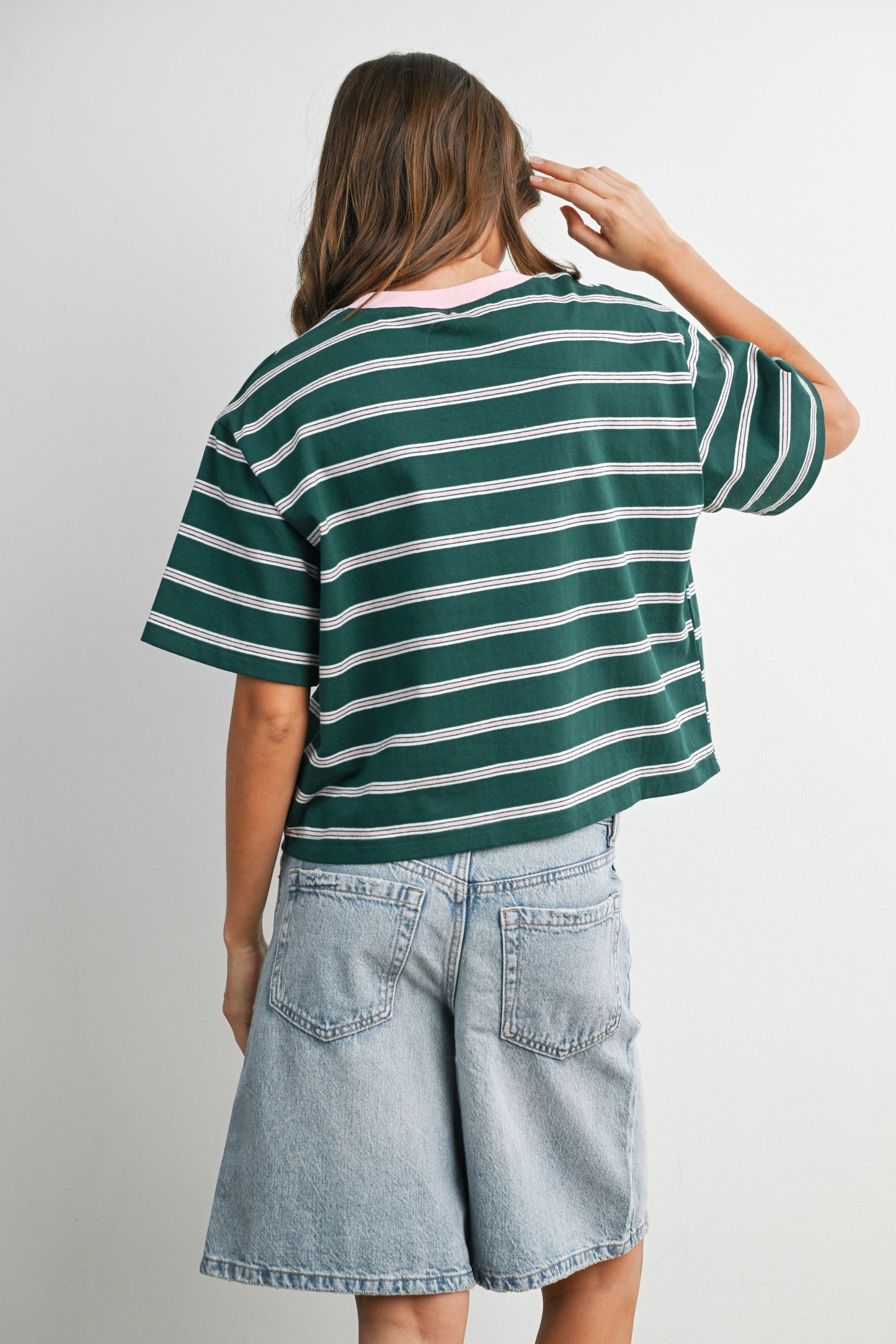Boxy cut green and light pink striped cropped tee. 
