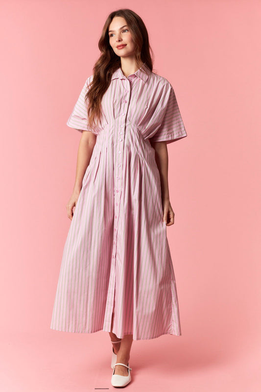 A short-sleeve button-up midi shirt dress in a pink and green vertical stripe pattern featuring a traditional collar, a full button-down front, and a pleated waistline.