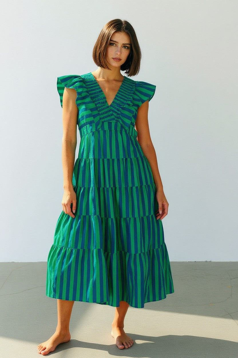 Striped Ruffle-Sleeve Tiered Cotton Midi Dress. With a bold vertical stripe pattern, a deep V-neckline, and soft ruffle sleeves in green and blue. 