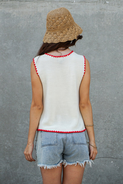 A women's sleeveless textured knit button-down vest tank top in ivory featuring a red scalloped contrast trim along the neckline, front placket, armholes, and hem.