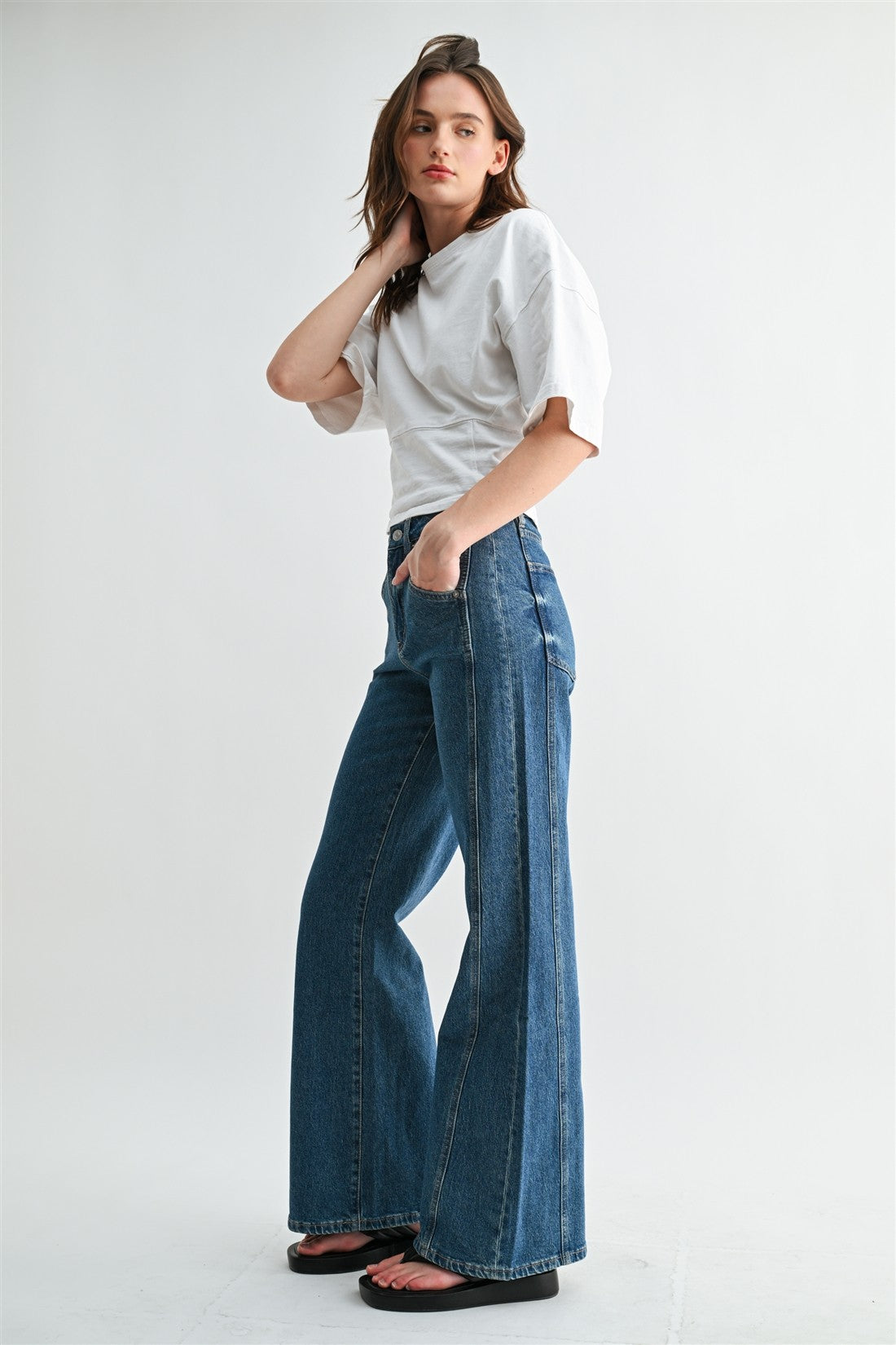Stretch denim with Side Panel Wide Leg Jean in Chathams Sea. 
Button and zipper closure
Front and back pockets 