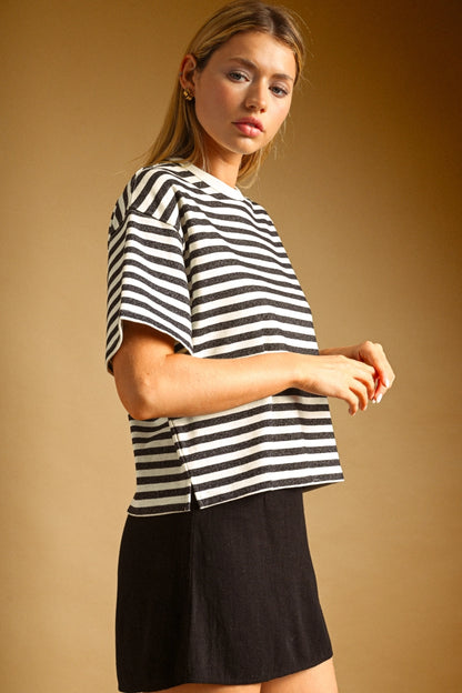 A women's relaxed short-sleeve t-shirt in a charcoal gray and white horizontal stripe pattern with a classic crew neckline.