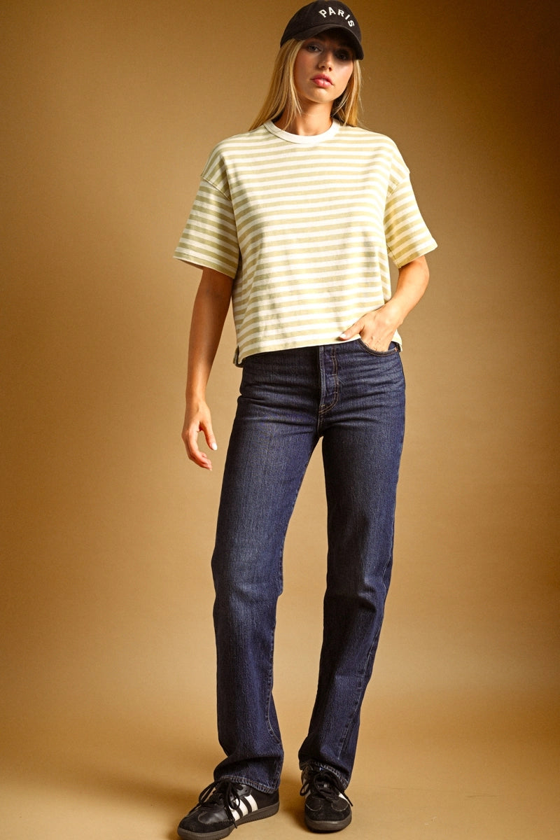 A women's short-sleeve crewneck t-shirt featuring a pastel lemon yellow and white horizontal stripe pattern in a relaxed fit.