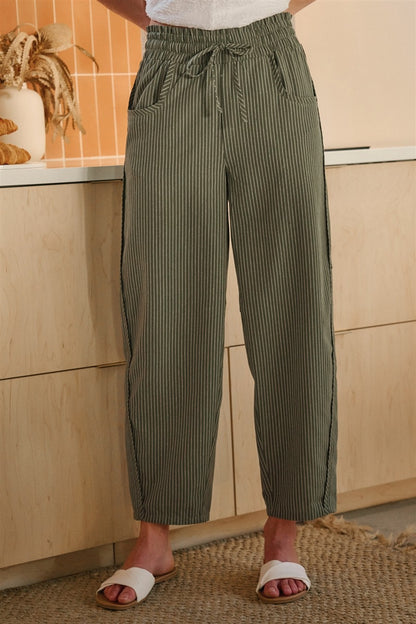 Olive and oatmeal vertical striped linen-blend pants featuring a high-rise elastic drawstring waistband, a relaxed tapered leg, and functional side utility pockets.