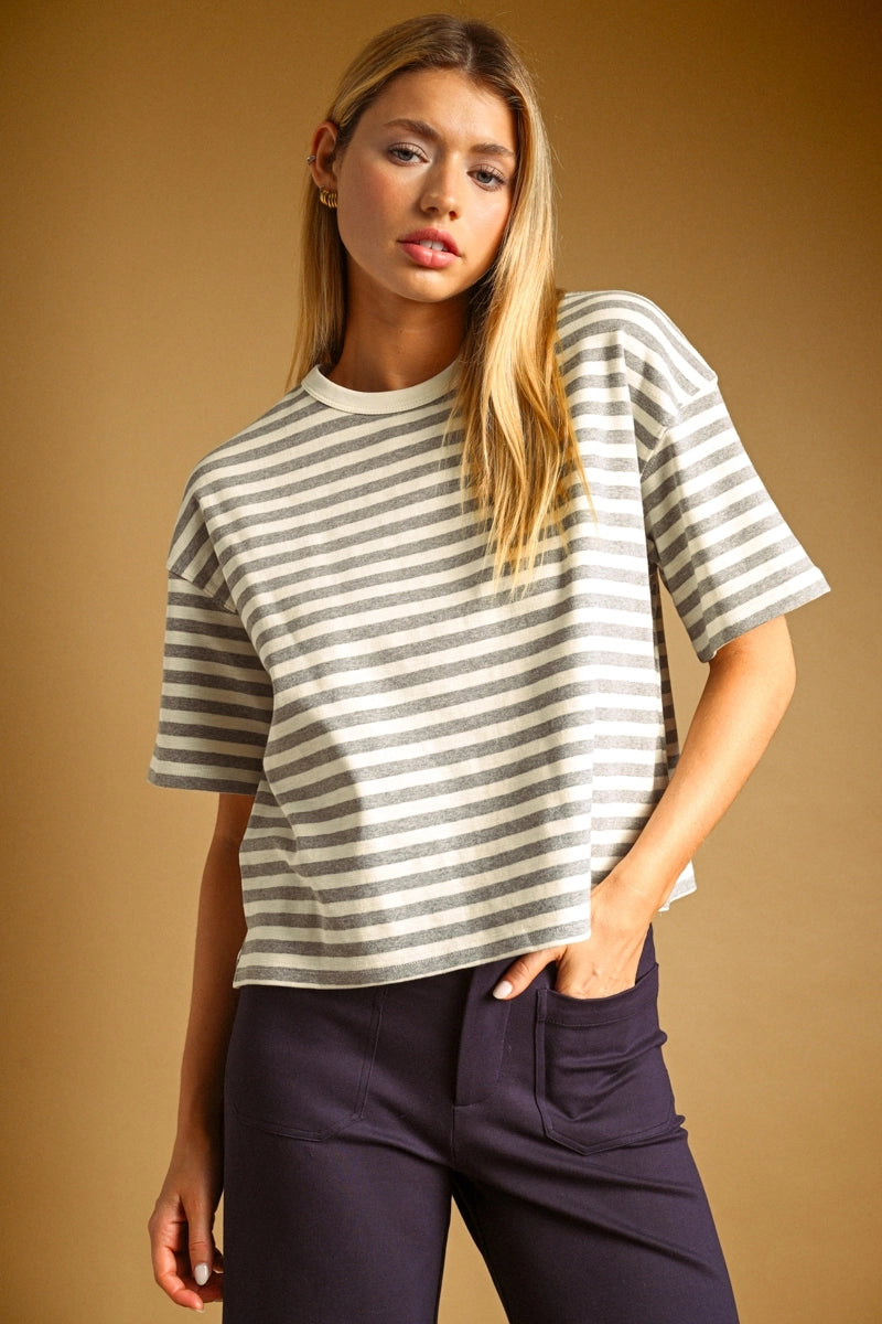 A women's crewneck short-sleeve tee featuring a light heather gray and white horizontal stripe design in a soft, relaxed fit.