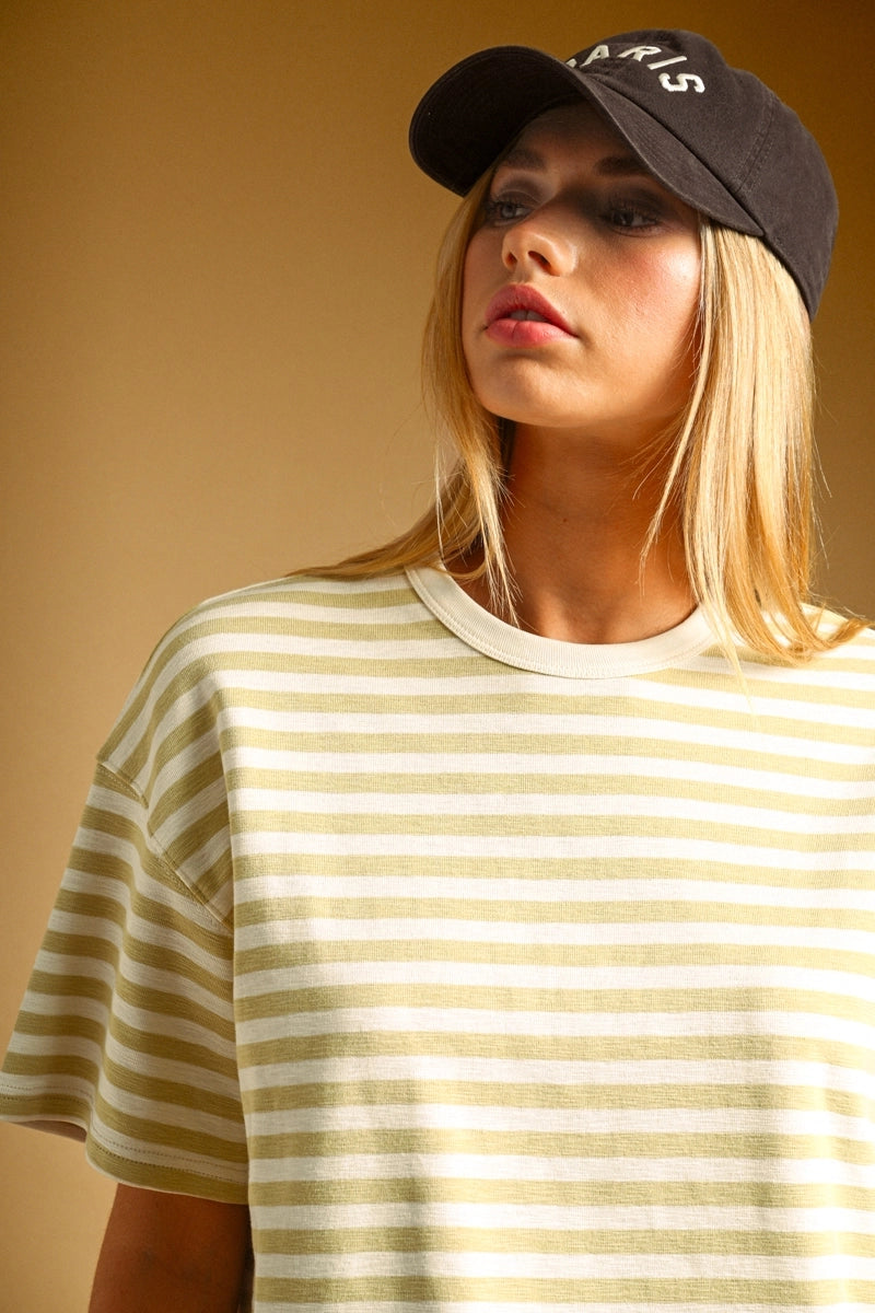 A women's short-sleeve crewneck t-shirt featuring a pastel lemon yellow and white horizontal stripe pattern in a relaxed fit.