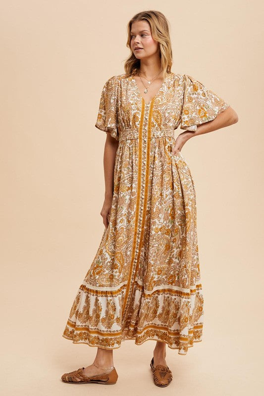 The Gisborne Flutter Sleeve Floral Maxi Dress in Antique Gold