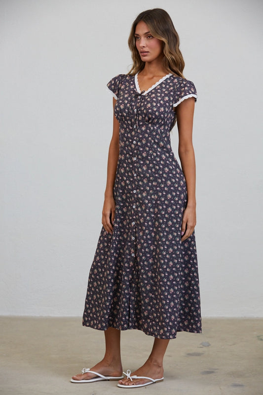 A women's short flutter sleeve midi dress in antique black featuring a pink vintage rose floral print, white scalloped lace trim along the V-neckline, and a full button-down front.