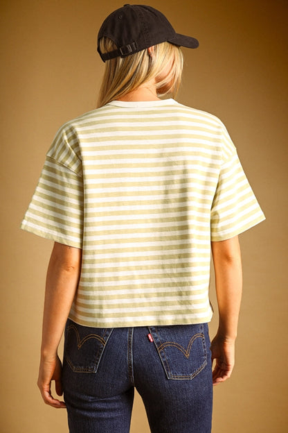A women's short-sleeve crewneck t-shirt featuring a pastel lemon yellow and white horizontal stripe pattern in a relaxed fit.
