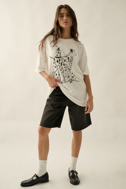 An ivory graphic tee featuring a black Dalmatian dog design, a soft crew neckline, and a relaxed, comfortable fit for everyday wear.
