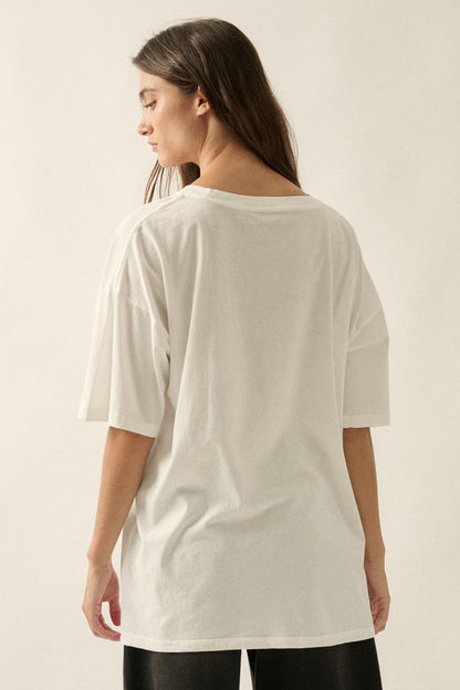 An ivory graphic tee featuring a black Dalmatian dog design, a soft crew neckline, and a relaxed, comfortable fit for everyday wear.