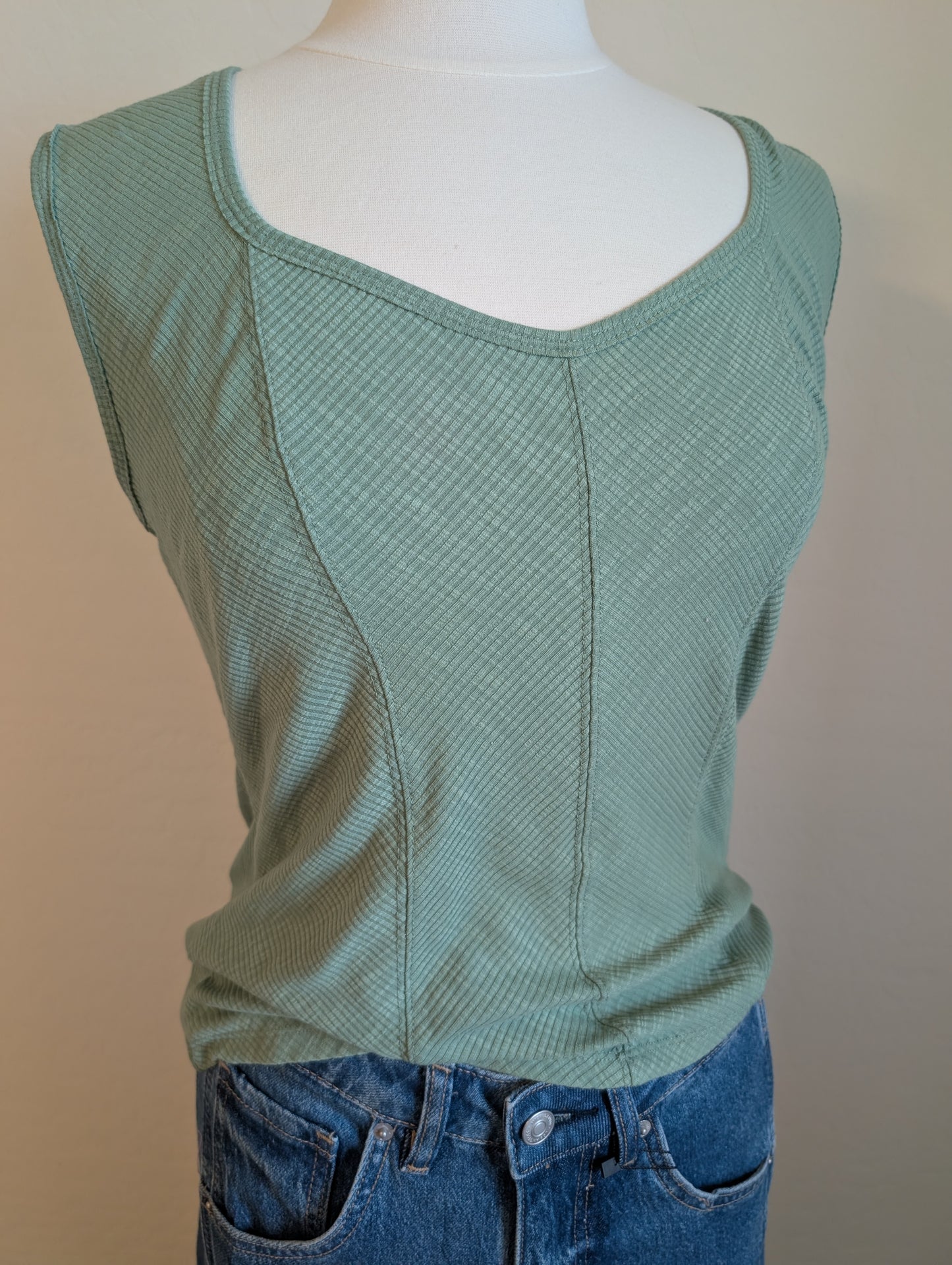 Ribbed tank with sweetheart neckline in green. 