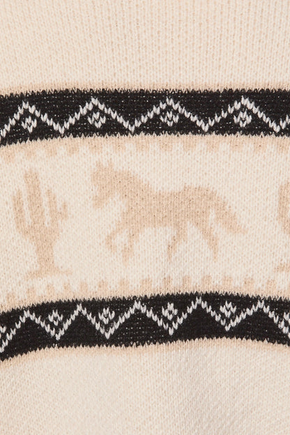 A women's cream knit zip-up collared sweater jacket featuring a southwestern geometric pattern, tan galloping horse motif, high collar, and front slip pockets.