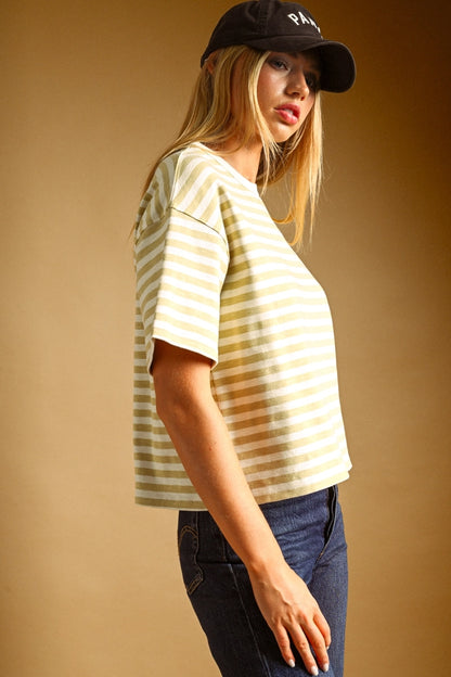 A women's short-sleeve crewneck t-shirt featuring a pastel lemon yellow and white horizontal stripe pattern in a relaxed fit.