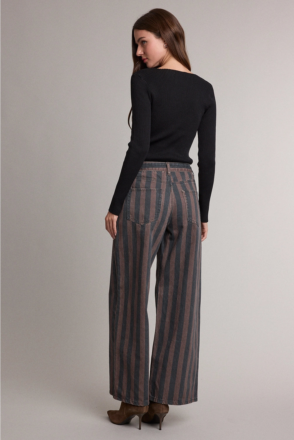Women's high-rise wide-leg jeans in a brown and washed-black vertical stripe featuring classic five-pocket styling and a relaxed straight silhouette.