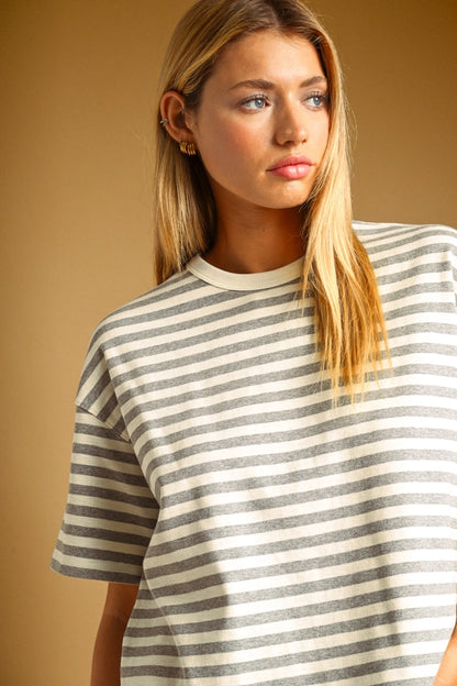 A women's crewneck short-sleeve tee featuring a light heather gray and white horizontal stripe design in a soft, relaxed fit.