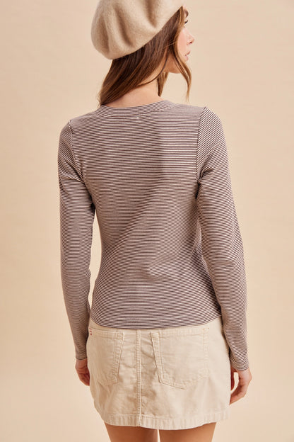 A women's mocha brown and cream micro-striped long-sleeve ribbed knit top featuring a notch neckline, front button closure, and fitted silhouette.