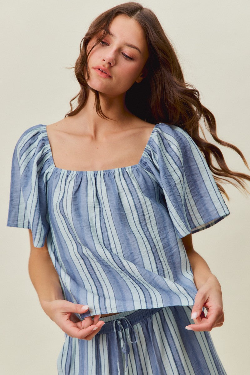 A women's lightweight square-neck blouse featuring vertical stripes in blue tones with loose flutter sleeves and a relaxed fit.