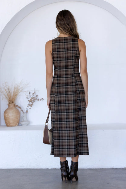 A women's sleeveless midi dress in brown and black plaid featuring a boat neckline, vertical front buttons, and a straight column silhouette.