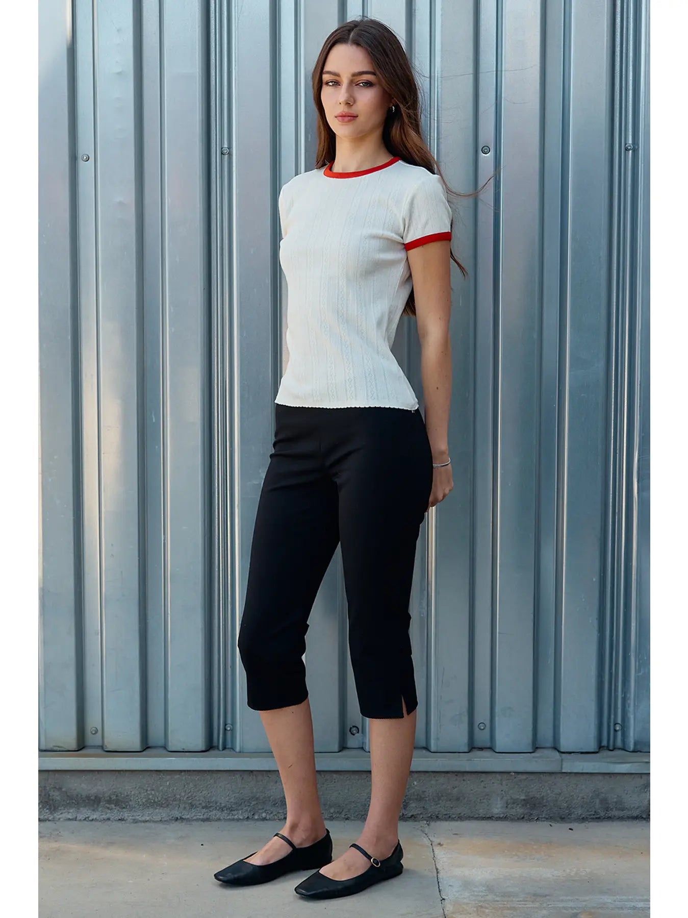 A women's ivory pointelle knit crewneck ringer t-shirt featuring bright red contrast trim along the neckline and sleeves, short sleeves, and a textured vertical diamond stitch pattern.