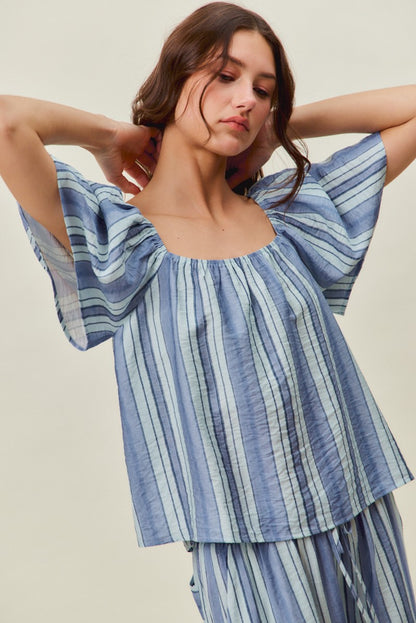 A women's lightweight square-neck blouse featuring vertical stripes in blue tones with loose flutter sleeves and a relaxed fit.