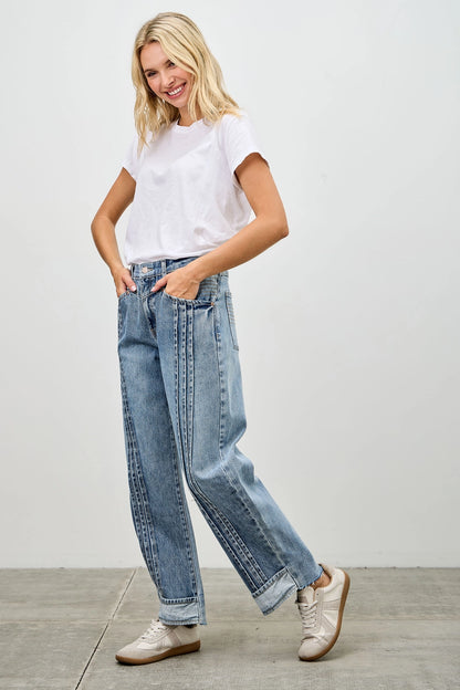 Medium wash barrel denim jeans. 
Button and zipper closure 
Front pleated details
False front cuff