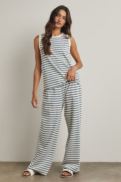 Blue + Cream striped set
Top is a tank with a high rounded collar
The bottoms contain an elastic waist and pockets 